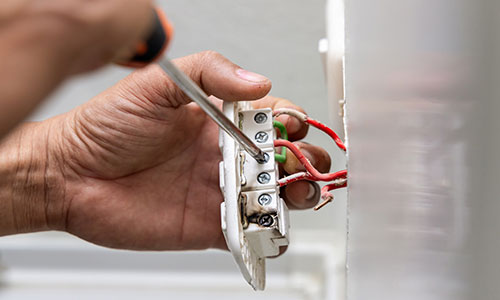 Réparation de prise de courant à Houplines